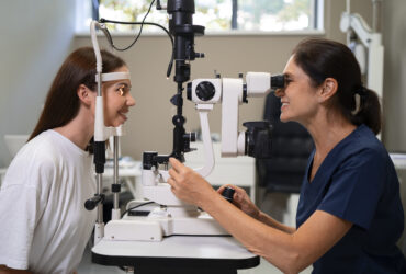 medium-shot-woman-getting-her-eyes-checked